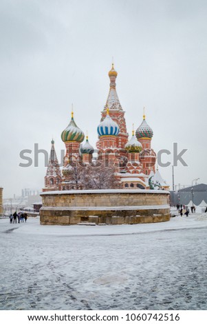 St. Basil Cathedral seen through the snow. Red Square, Moscow, Russia