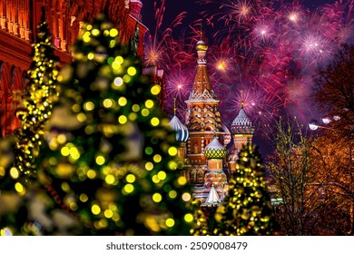 St. Basil's Cathedral with festive fireworks and decorated fir trees. Blurred scenery in the foreground, against the background of the night sky. Festive fireworks. Moscow, Russia - Powered by Shutterstock