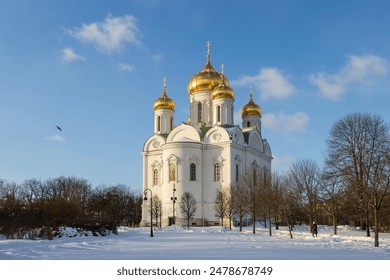 St. Catherine's Cathedral, Pushkin town, Saint Petersburg, Russia. Winter landscape with a large beautiful Orthodox church. White church with golden domes against the blue sky. Architectural landmark. - Powered by Shutterstock
