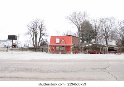 St. Claire, Missouri United States - March 3 2022: A Small Red Snow Cone Shop During The Winter