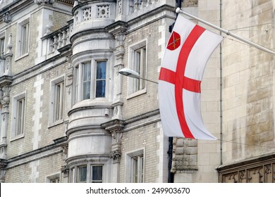 St. George flag on a pylon in City of London, United Kingdom - Powered by Shutterstock