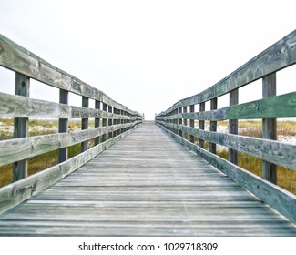 St. George Island, FL - Walkway To The Beach On An Overcast Day.