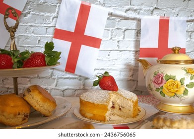 St Georges day  afternoon tea celebrations  English flag  strawberries and  cream  scones  english tea  vintage tea party 