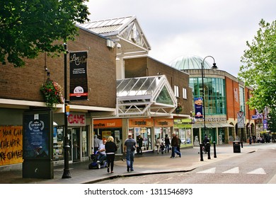 St. Helens, Merseyside, Lancashire, England, U.K. - 08/26/2014. A View Of Bridge Street And The Entrance To The Church Square Shopping Centre.