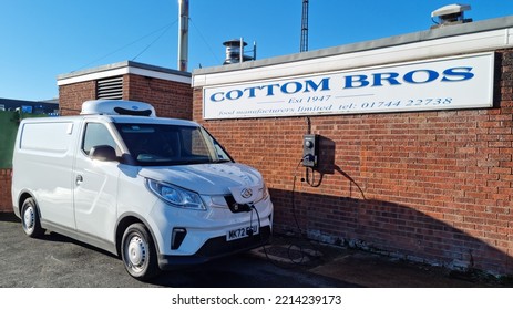 St Helens Merseyside UK 10 15 22 Electric MAXUS E DELIVER 3 Delivery Van Charging On A ROLEC EV Charging Point Outside Cotom Brothers Factory And Shop. Famous For Its Hotpots And Other Meat Products.