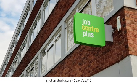 St Helens, Merseyside, UK. 31032018 The Square Green Job Center Plus Sign Attached To The Outside Wall Of The Government Department Office Building With Copy Space.