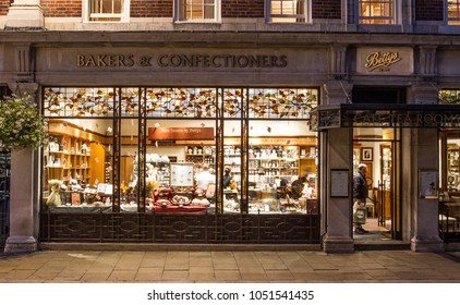 St HELENS SQUARE, YORK, UK - SEPTEMBER 9, 2016.  The Exterior And Window Display Of The Popular Betty's Cafe And Tea Rooms In York, UK At Night.