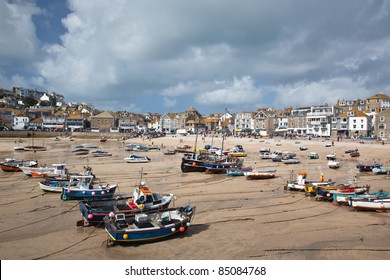 St Ives Harbor At Low Tide With Several Mainly Fishing Boats Waiting For High Tide