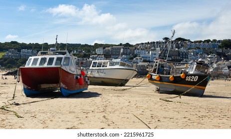 St Ives Harbour At Low Tide With Fishing Boats Waiting For High Tide, Corwall, UK 27 August 2022