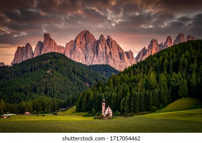 St Johann Church and Dolomite Alps at sunset, Santa Maddalena, Val Di Funes, Dolomites, Italy. Amazing nature Background