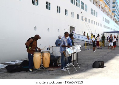 ST. JOHNS, ANTIGUA - 21 MAR 2012: Local Calypso Band Plays For Tourist As They Disembark A Cruise Ship.