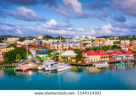 St. John's, Antigua and Barbuda town skyline on Redcliffe Quay at dusk.