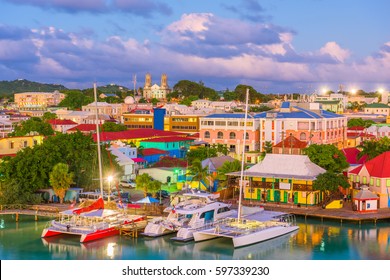 St. John's, Antigua port and skyline at twilight.