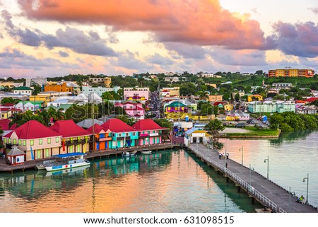 St. John's, Antigua port and skyline at dusk.