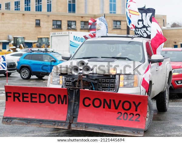 ST. JOHN\'S, CANADA, JANUARY\
29, 2022: Trucks taking part in the anti-vaccine mandate protest,\
taken in St. John\'s, Newfoundland and Labrador on January 29,\
2022.