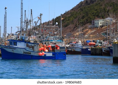 ST. JOHN'S HARBOR CANADA MARCH 17: St. John's Harbor, Newfoundland, Canada On March 17, 2014. Town Of St. John's Prepares For Celebration Of Victoria Day Long Weekend All Fishing Boats Are Moored In Harbor