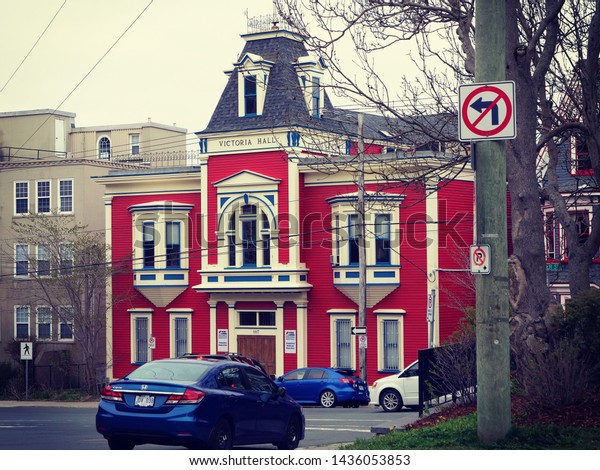 St. John\'s, Newfoundland, Canada / June 7, 2019:\
Beautiful colorful buildings. Its name attributed to the Nativity\
of John the Baptist, when John Cabot was believed to have sailed\
into the harbor.