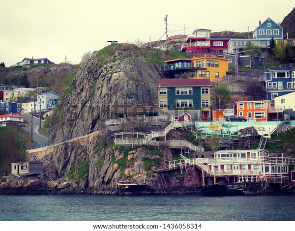 St. John\'s,\
Newfoundland, Canada / June 7, 2019: Beautiful colorful buildings.\
Nativity of John the Baptist, when John Cabot was believed to have\
sailed into the harbor.