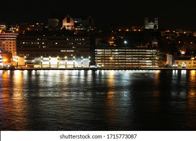 St. John's, NL, Canada, 04/23/2020 St. John's Harbour At Night, No Ships Due To Covid-19. Downtown View Showing Waterfront, The Rooms, The Basilica, Atlantic Place, And Other Downtown Buildings.