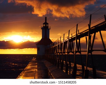 St. Joseph Lighthouse At Sunset On Lake Michigan