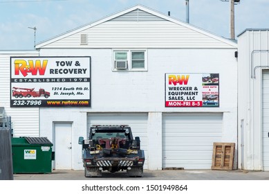 St. Joseph, Missouri / United States Of America - August 29th, 2019 : Entrance And Garages Of R&W Tow And Recovery And Wrecker & Equipment Sales.