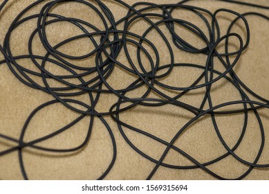 St. Joseph, MO / United States Of America - November 11, 2019 : A Tangled Mess Of Xlr Microphone Cable On Beige Carpet.  Audio Cable Mess On The Floor.