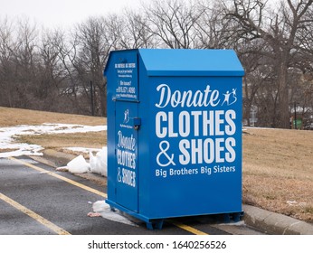 St. Joseph, MO / United States Of America - January 31st, 2020 : Large Secure Donation Drop Off Bin For Big Brothers Big Sisters.  Blue Metal Donation Box On The Edge Of A Parking Lot.