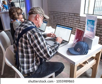 St Louis, Missouri, United States-March 27, 2018-Old Man, Senior Citizen, At Computer At Facebook Community Boost Event, Small Business Owners Learn How To Promote Businesses, Social Media 
Facebook