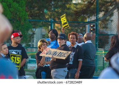 St. Louis, Missouri, US - October, 2016: A Group Of Unknown People Protesting For The Raise Of Minimum Wage At A Site For Protest Near Washington University For The 2016 Presidential Debate 