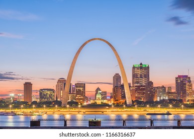 St. Louis, Missouri, USA Downtown Cityscape With The Arch And Courthouse At Dusk.