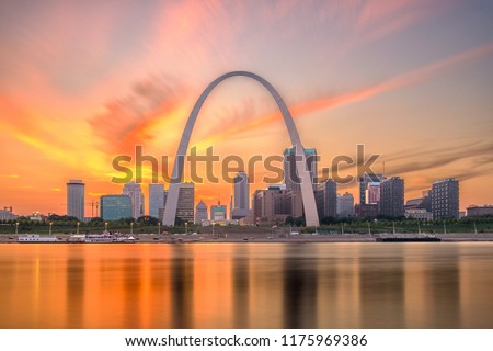 St. Louis, Missouri, USA downtown cityscape on the river at dusk.