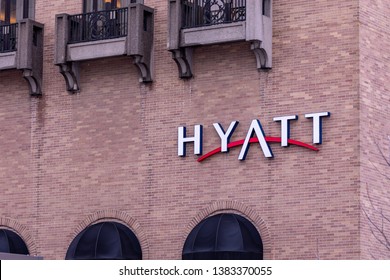 St Louis, Missouri \ USA - January 16 2019: The Logo And Sign Of Hyatt Hotel Network On A Side Of A Brick Building.