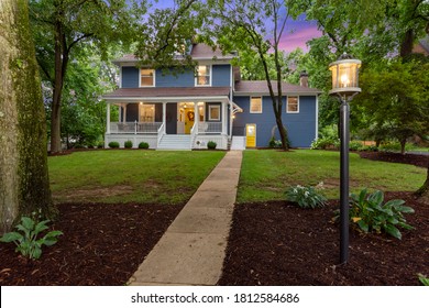 St Louis, Mo USA 9/9/2020 Turn Of The  1900 Century Home And Front Porch Renovated At Dusk.