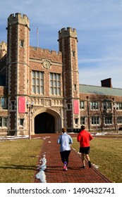 St Louis, MO, USA February 25, 2015 Two Joggers Run Through The Main Campus Of Washington University In St Louis, Missouri