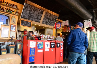 St. Louis, MO, USA February 26, 2015 A lunch time crowd examine the chalkboard menu at a rib and barbeque joint in St Louis