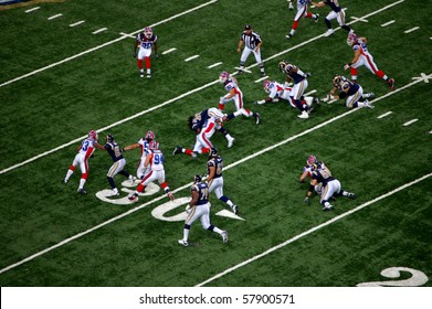 ST. LOUIS - SEPTEMBER 28: Rams Running Back Steven Jackson Is Upended By Ko Simpson Of The Bills In A Game At The Edward Jones Dome September 28, 2008 In St. Louis, MO