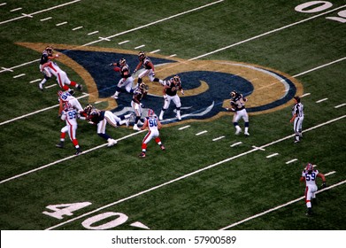 ST. LOUIS - SEPTEMBER 28:  Rams Quarterback Trent Green Is Hit As He Throws The Ball In A Game Against The Buffalo Bills At The Edward Jones Dome September 28, 2008 In St. Louis, MO