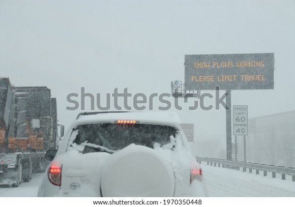 ST  LOUIS,\
UNITED STATES - Mar 05, 2008: Heavy traffic backup on a major\
highway in Missouri during a snowstorm\
