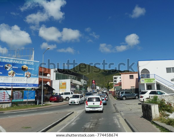 ST. MARTIN/SINT\
MAARTEN, BRITISH VIRGIN ISLANDS ISLANDS— MARCH 2017: A two-way\
street outside the cruise ship terminal in Philipsburg, Dutch side\
of St. Martin/Sint Maarten.