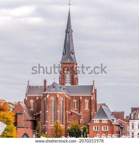 St. Martinus church (de Sint-Maartenskerk in Dutch) at Maas riverside in the Dutch city of Maastricht, Limburg Province, the Nethehrlands. Stock photo © 