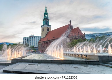 St Mary Church And Alexanderplatz Fountain At Sunset, Berlin.