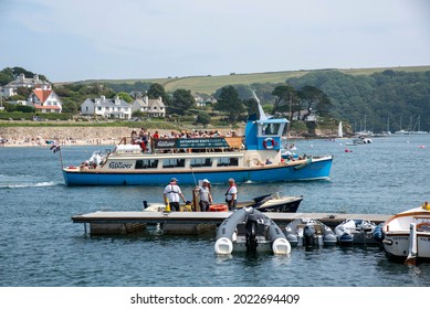 St Mawes, Cornwall, England, UK. 2021.  A passenger ferry departing St Mawes harbour with passengers bound for Falmouth.