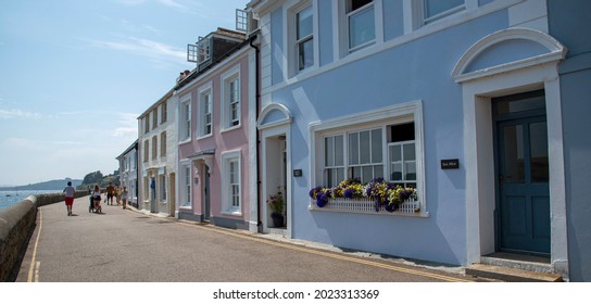 St Mawes, Cornwall, England, UK. 2021.  Pastel painted cottages on the seafront at St Mawes a popular Cornish holiday resort, UK.