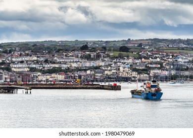 ST MAWES, CORNWALL, UK - MAY 12 : View of a ship approaching Falmouth harbour as seen from St Mawes, Cornwall on May 12, 2021