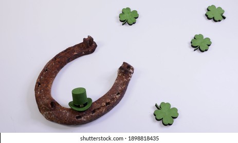 st patrick's day, clover hat and horseshoe