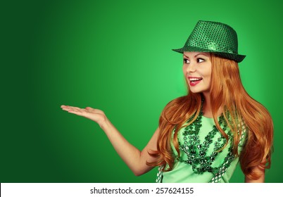 St Patricks Day Girl. Cheerful Young Woman Wearing Green Hat 