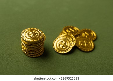 St. Patrick's Day Gold Coins on a green background. - Powered by Shutterstock