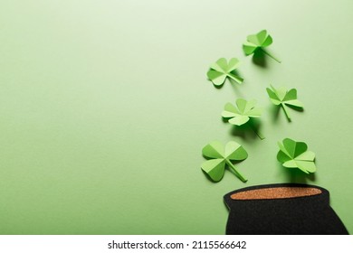 St. Patrick's Day. Green Background With Clover Leaves: Shamrock And Four-leafed And Pot Of Money. Copy Space. Paper Craft.