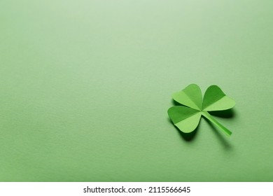 St. Patrick's Day. Green Background With Clover Leave Shamrock. Copy Space. Paper Craft.