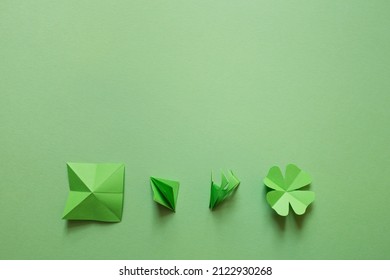 St. Patrick's Day. Green Background With Clover Leave Shamrock. Copy Space. Paper Craft.